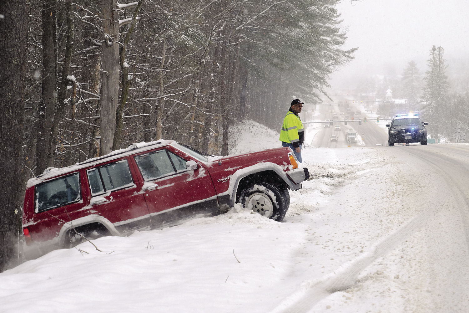 Snowstorm blankets region after springlike lull